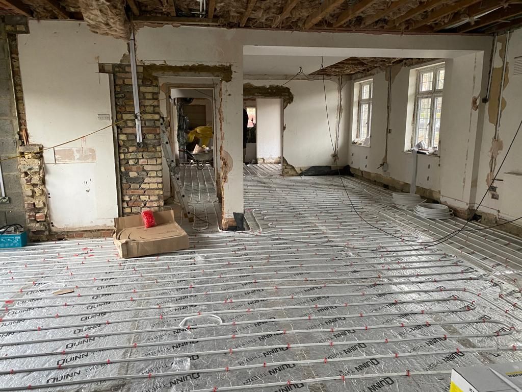 Underfloor heating pipework laid during the build